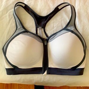 Only worn once, it was too big for me. Love the zippers on the front. Size L